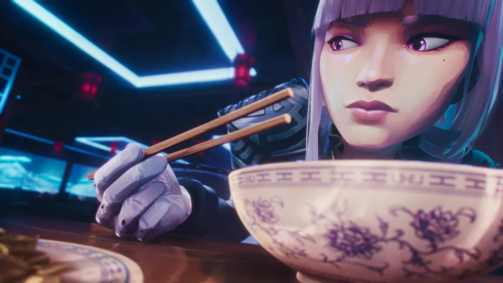Close-up of VALORANT agent Hush holding chopsticks over a bowl of noodles in the RISE AND FALL trailer