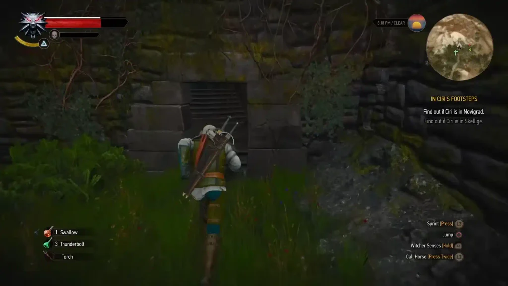 Geralt walks in through the entrance of Dragonslayer's Grotto