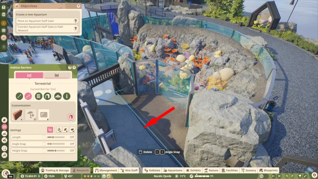 Planet Zoo 2 aquarium door bug path removal arrow pointing at the path