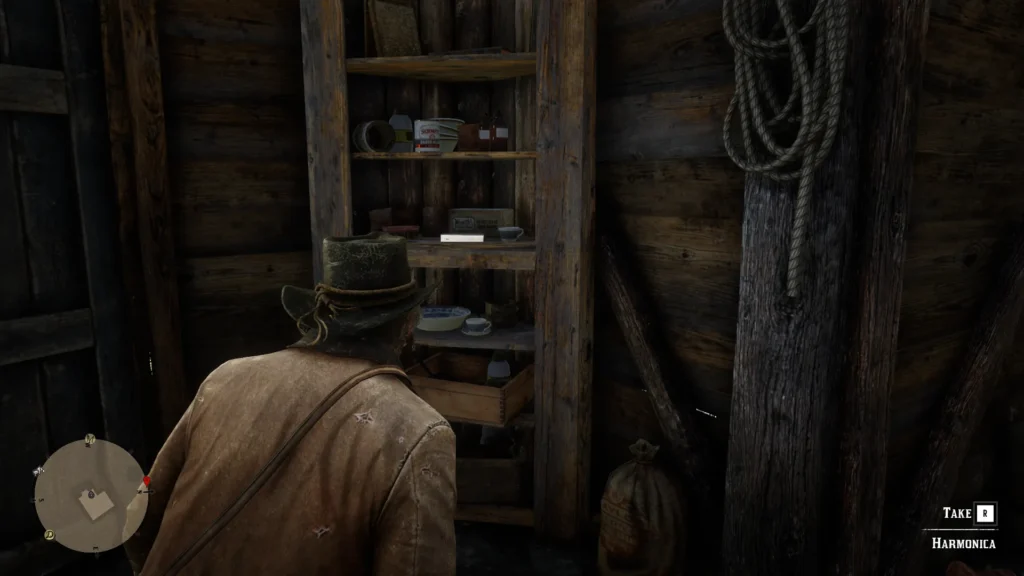 RDR2 harmonica on the shelf behind the front door at Granger's Hoggery